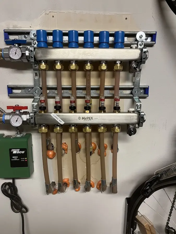 Plumber performing Gas Leak Detection at a residential property in McComb