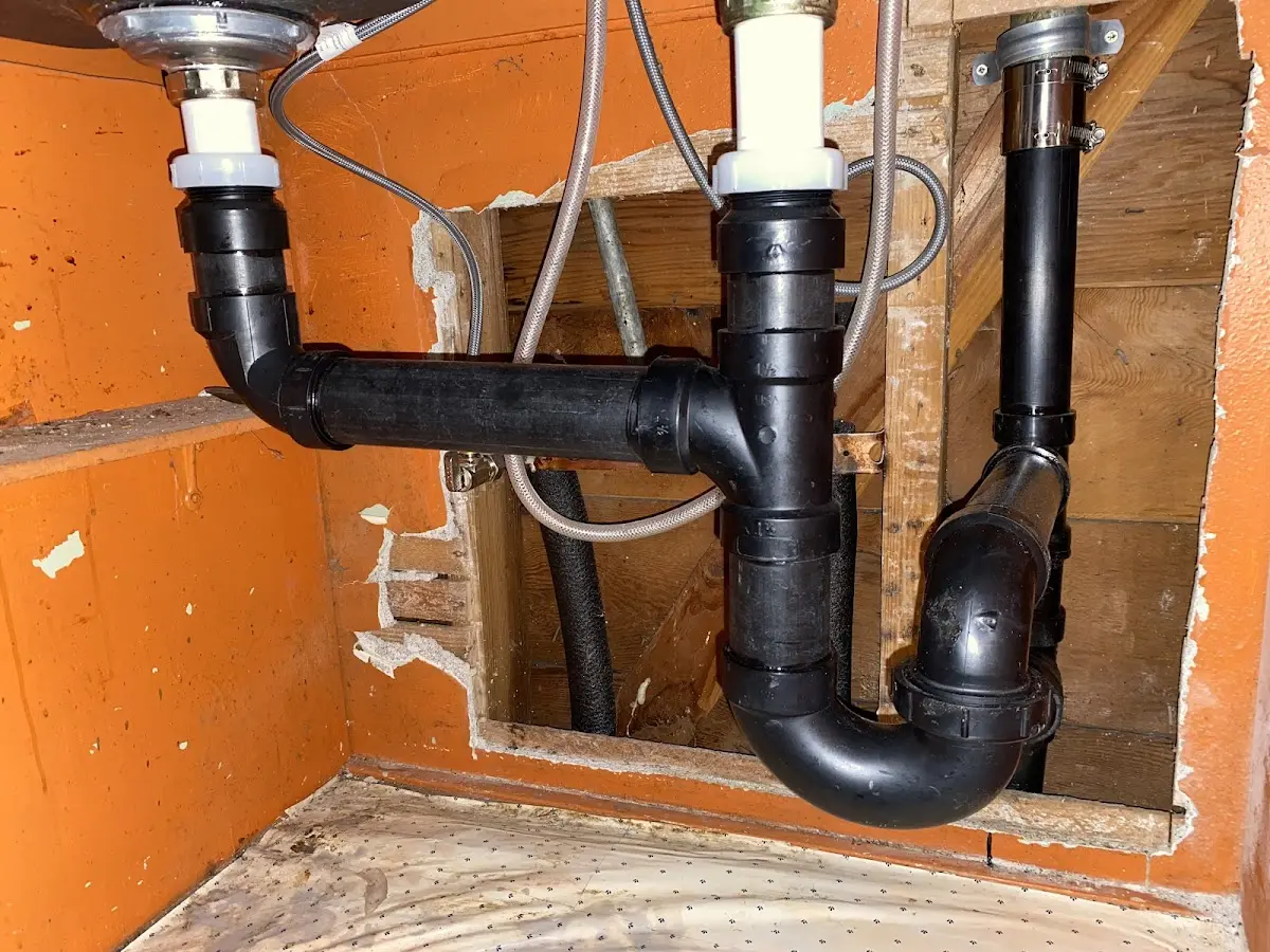 Professional Garbage Disposal Repair equipment and tools on the job in McComb